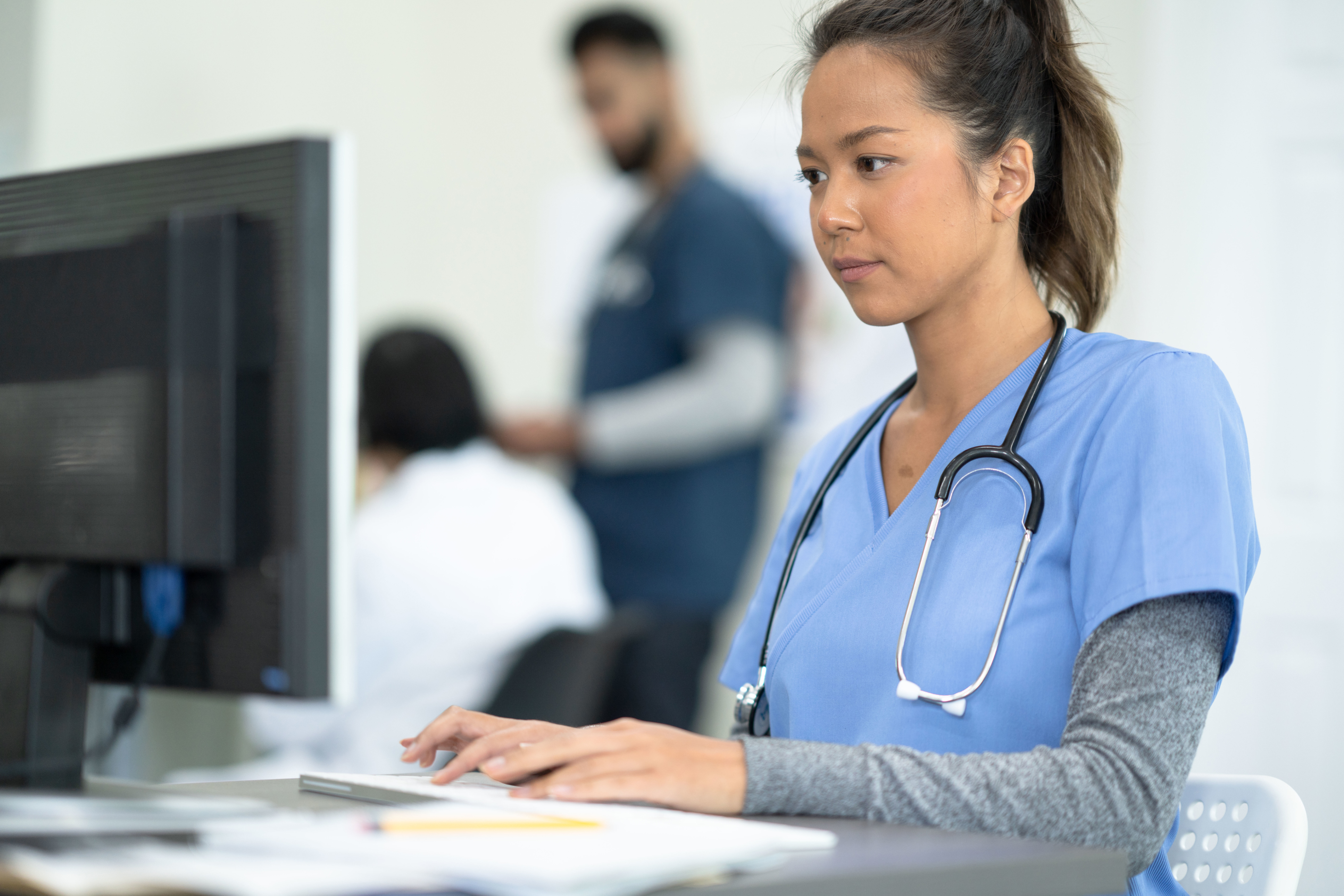 Nurse on computer