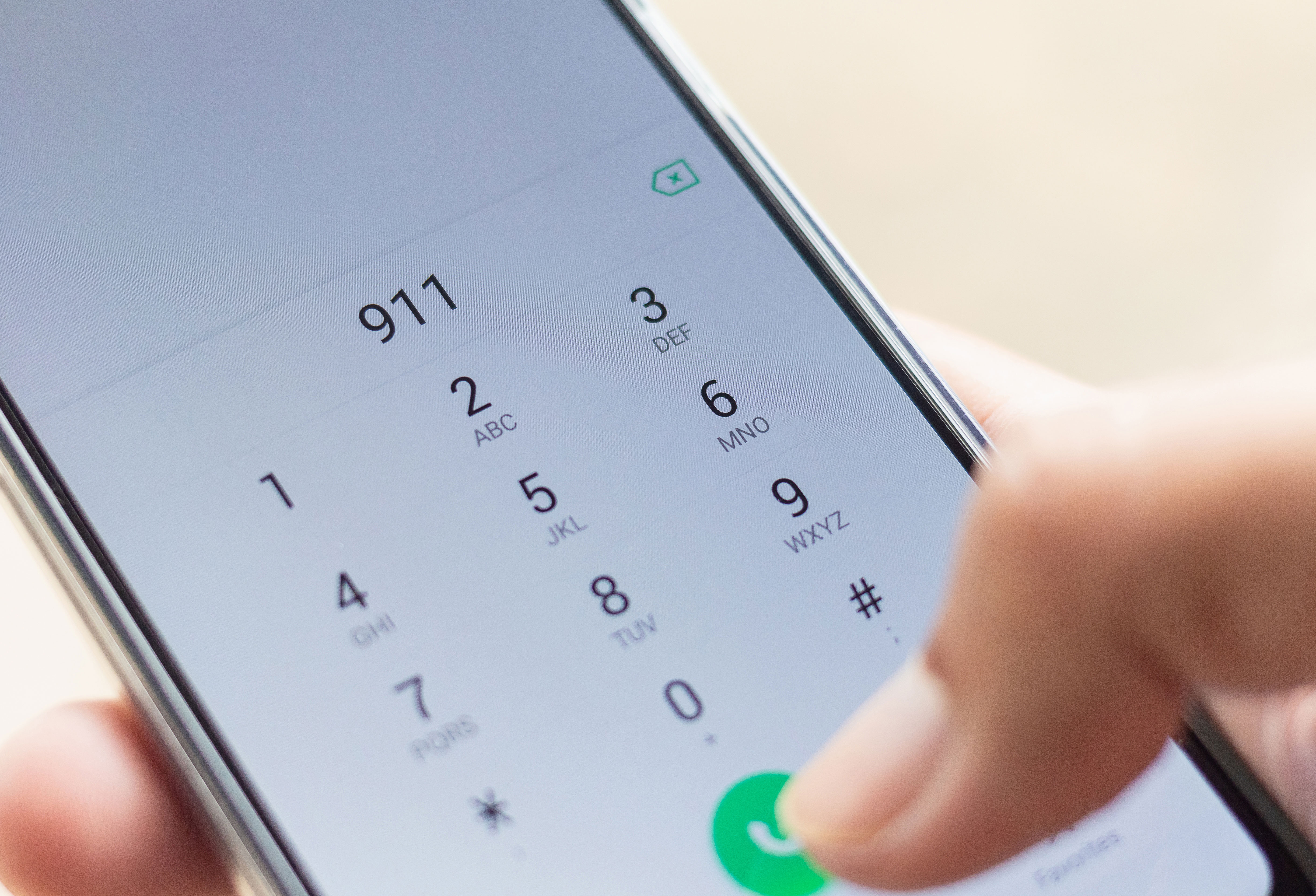 Dialing emergency number on a cell phone